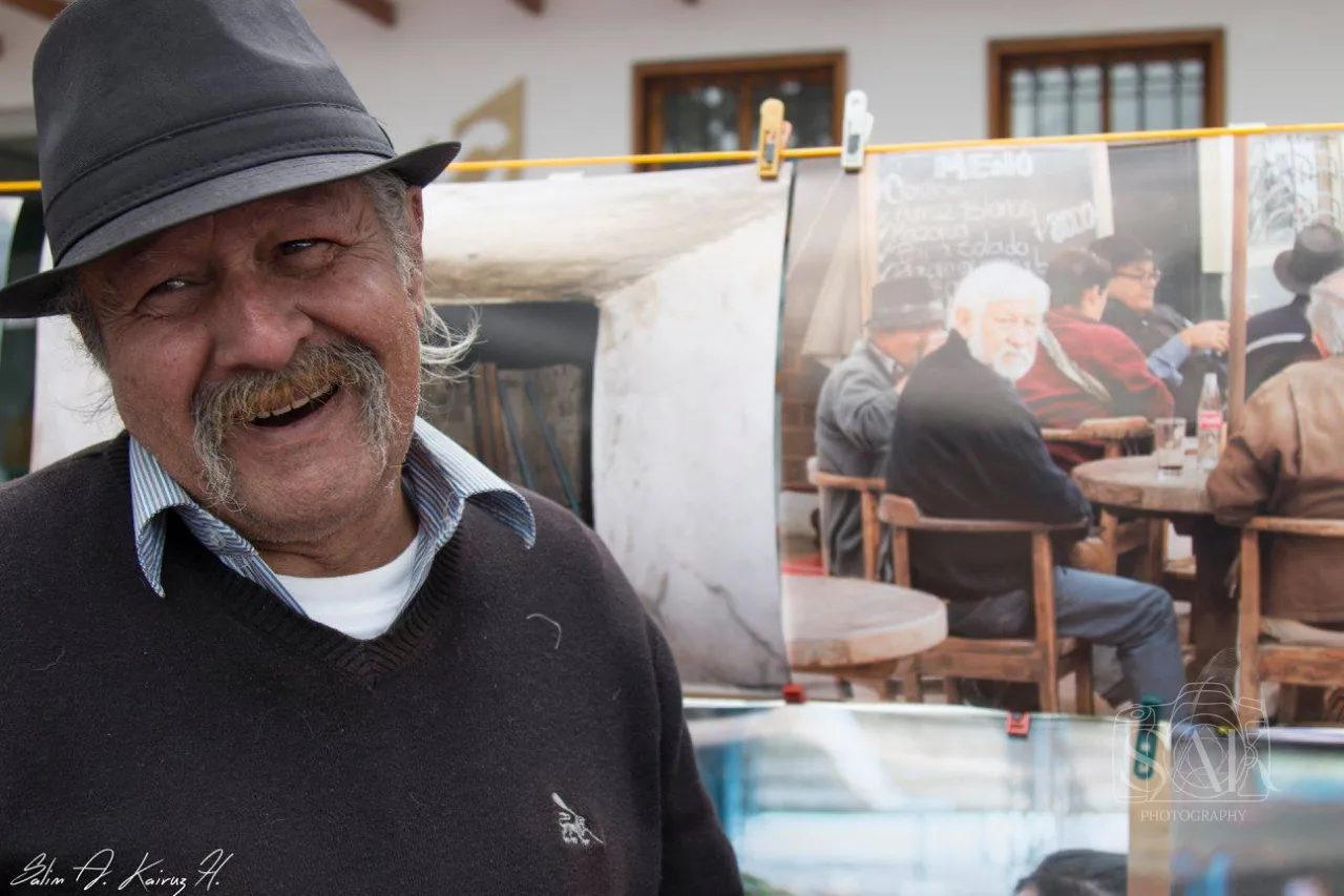 Portrait of an older man wearing a hat